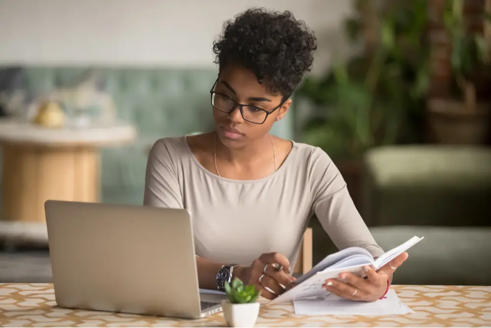 Girl researching substance abuse treatment costs.