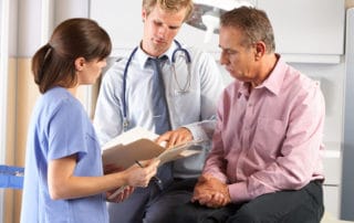 Doctor discussing San Antonio alcohol detox options with a patient.